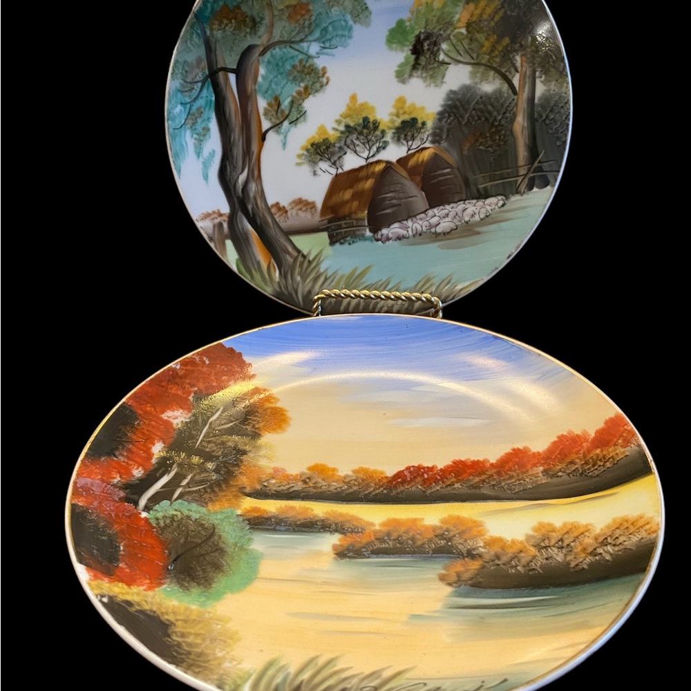 Vintage pair of wall hanging plates hand painted in Japan signed by artist